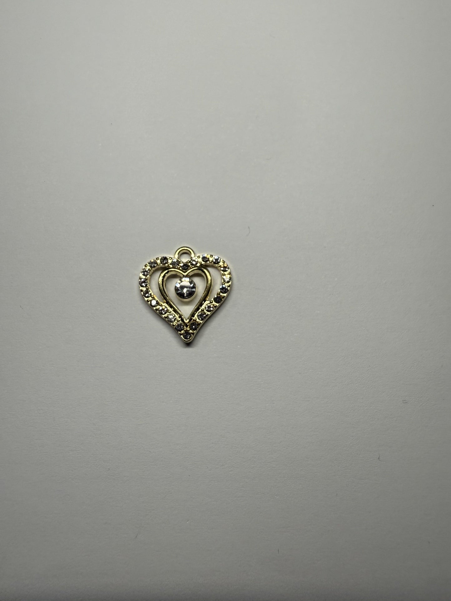 gouden hart met steentjes