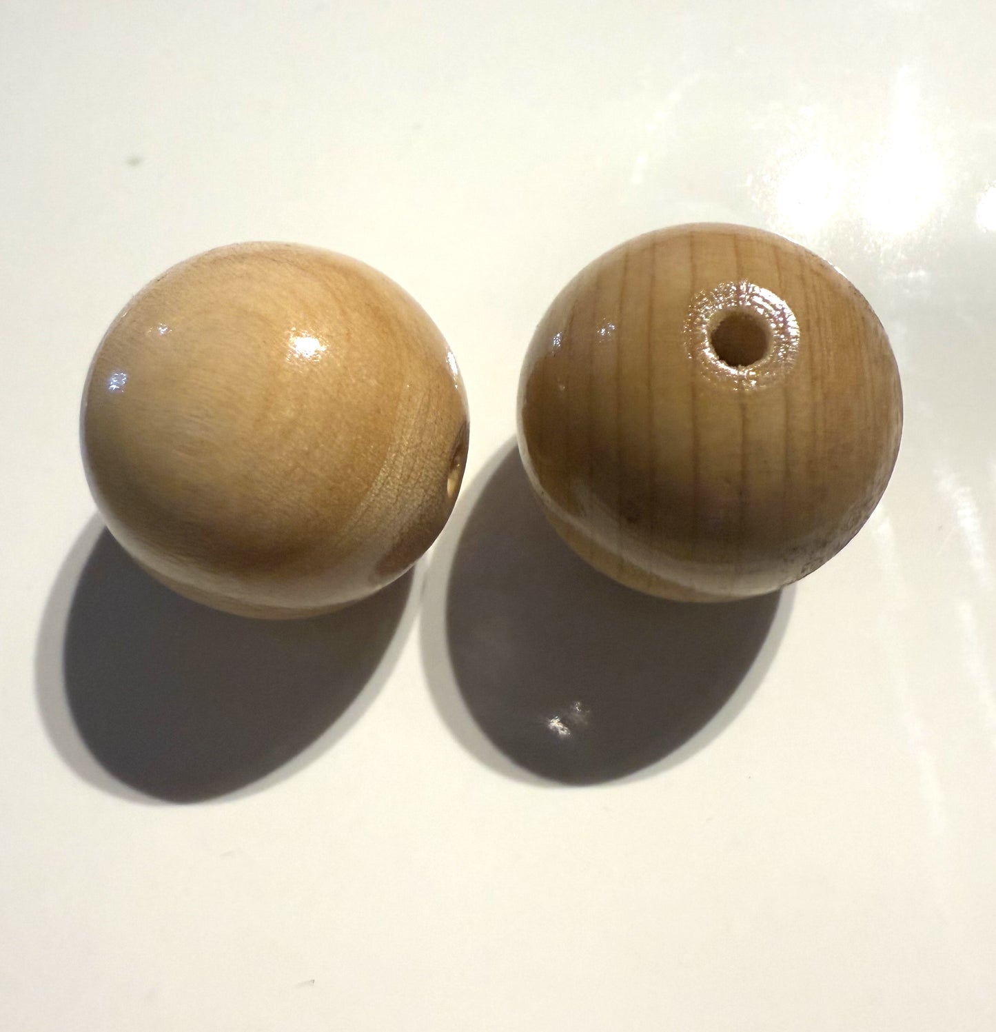 Beige houten kraal 23mm