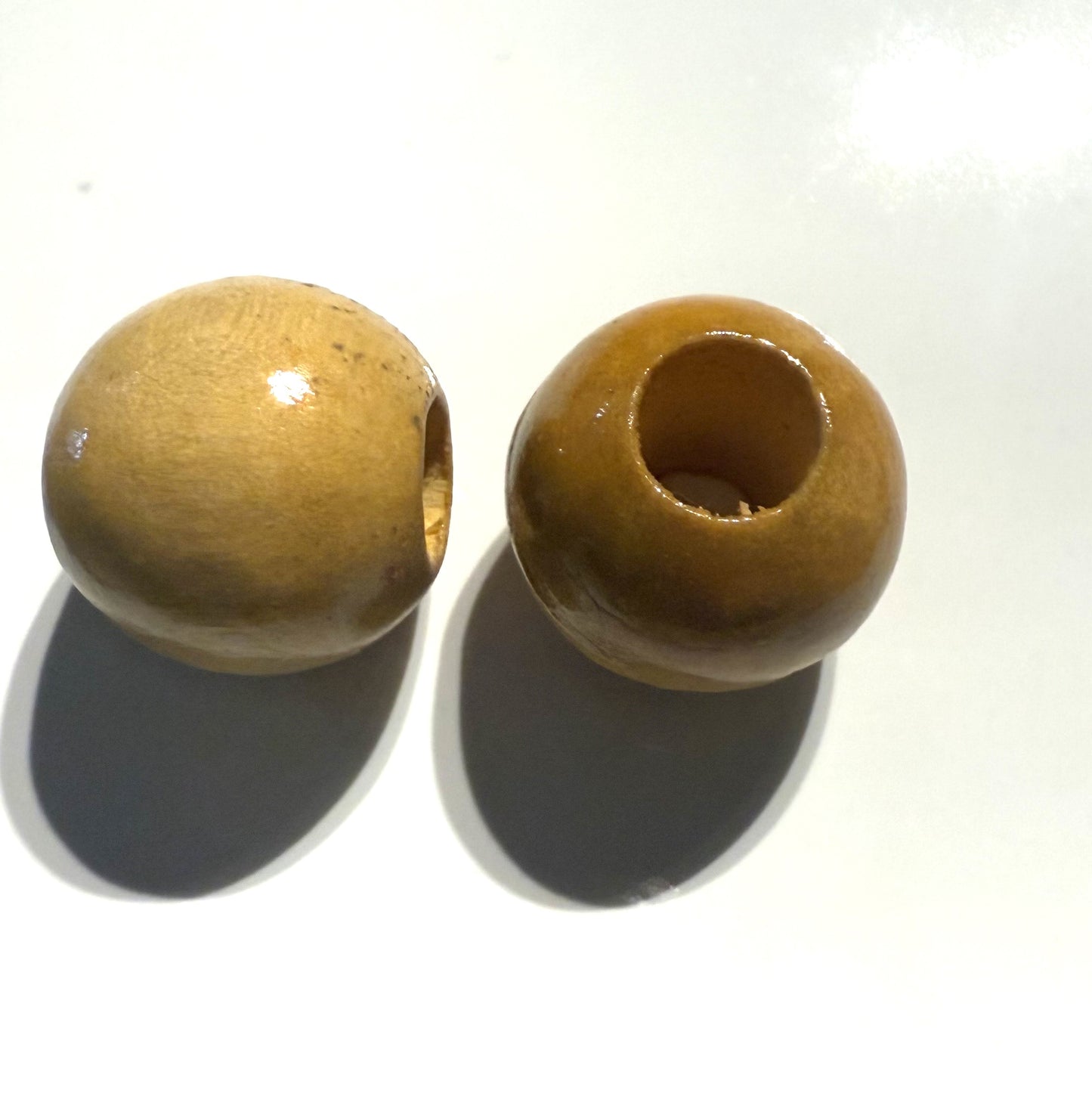 Beige houten kraal 21mm