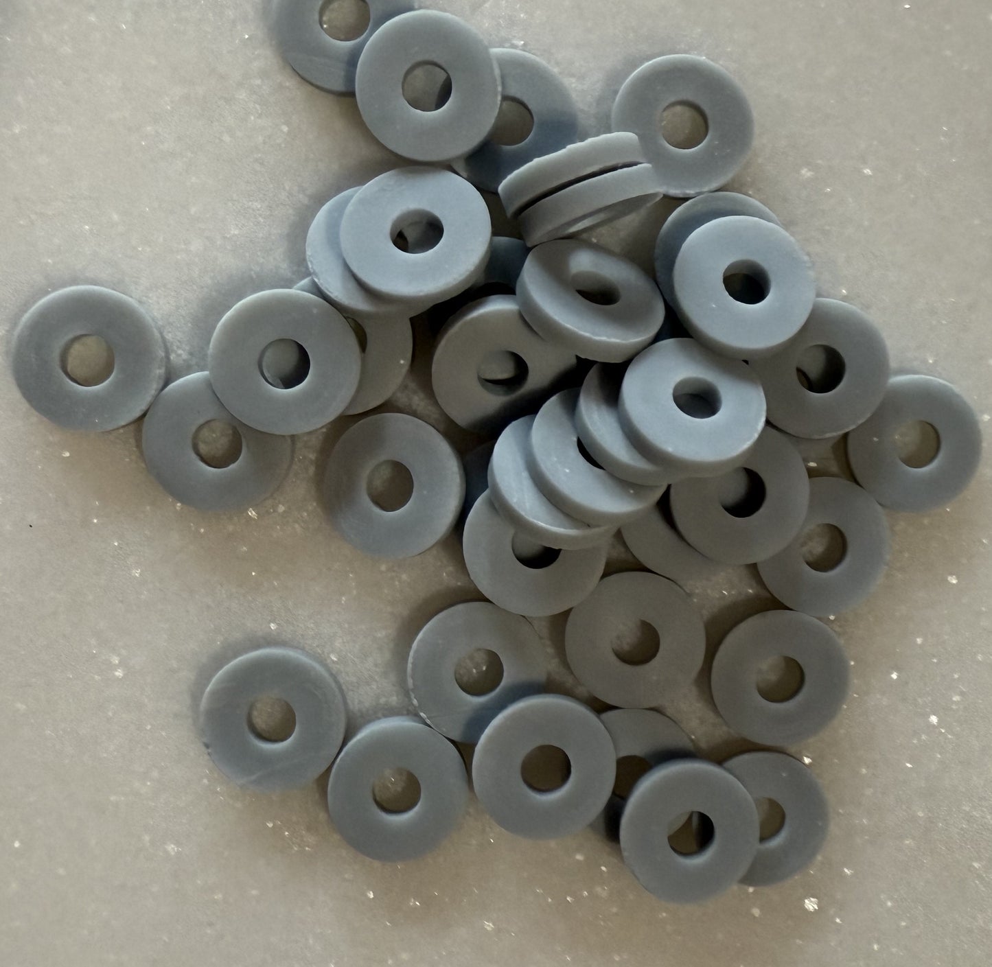 Grijze acryl schijfjes