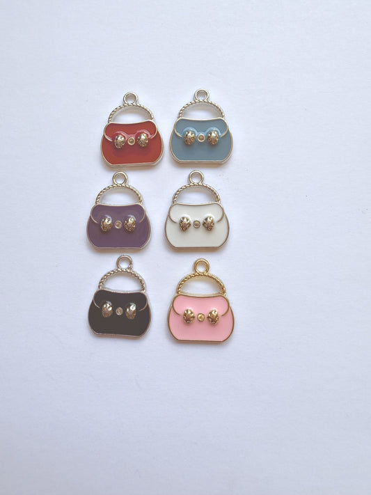 handtas Nr 105a wit, b roze, c rood, d paars, e blauw, f zwart