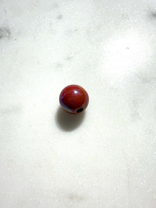 rood/roze keramiek kraal