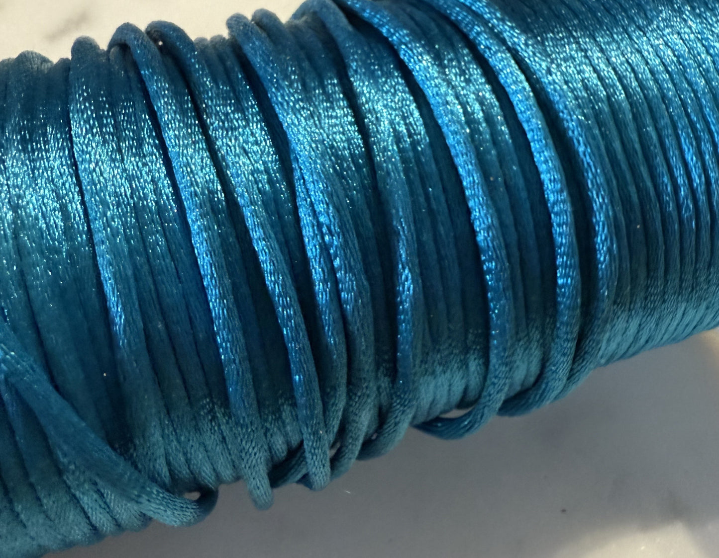 Satijnkoord fel blauw ( prijs is per meter )