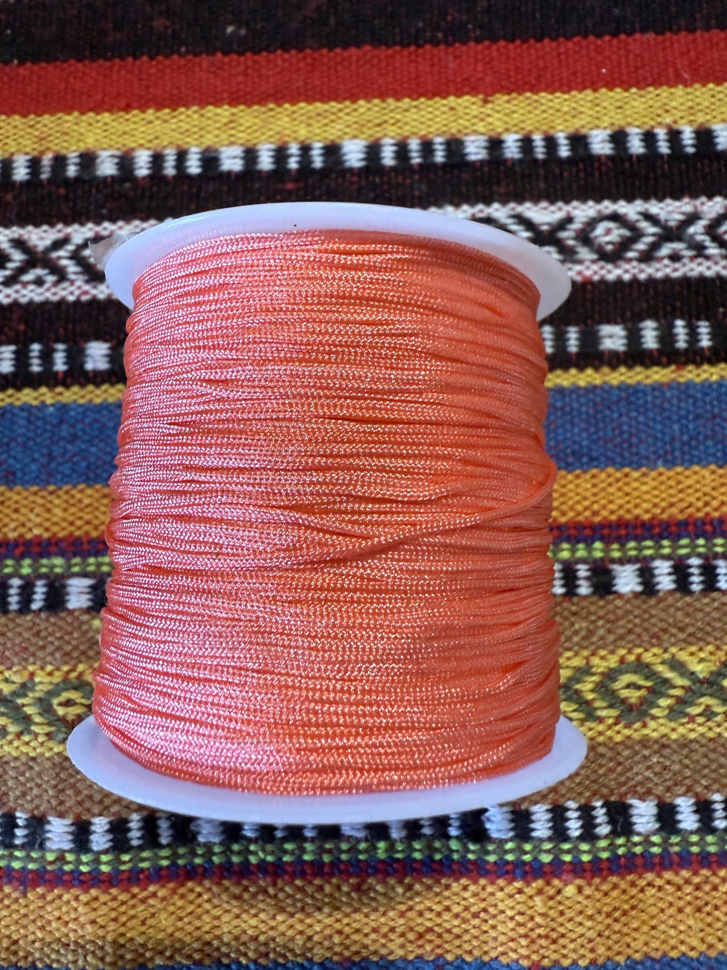 Macrame draad Oranje/roze ( prijs is per meter )