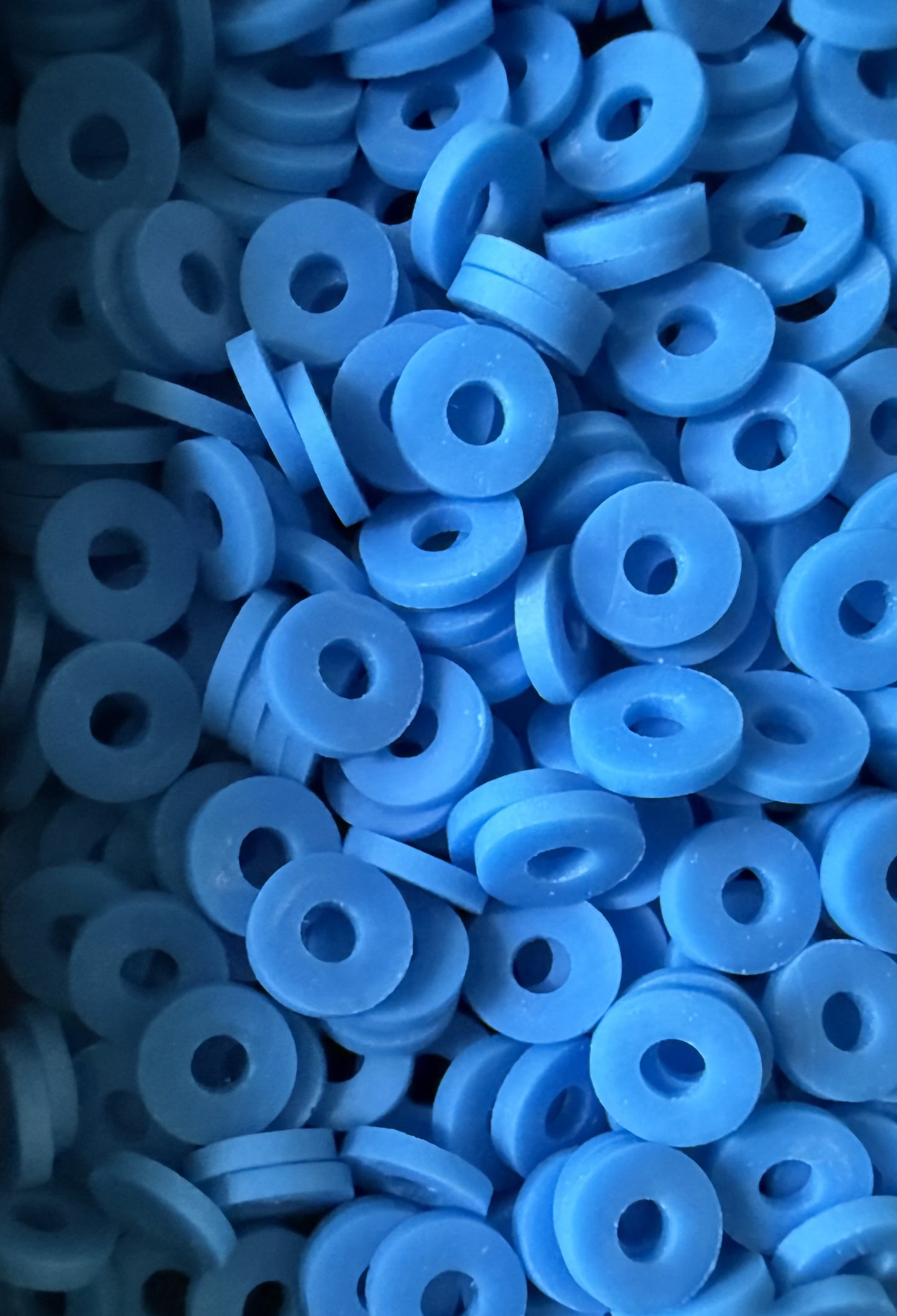 Blauwe polymeer schijfjes