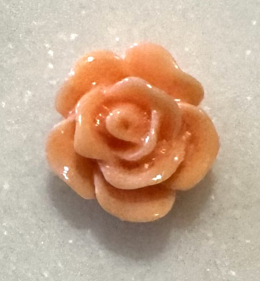 klein acryl bloempje in oranje